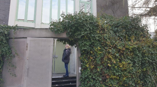 Joel Rubinfeld, a leader of Belgian Jewry, stands outside one of the synagogues that have closed down in recent years in Brussels, Belgium on Jan. 24, 2019. Cnaan Liphshiz