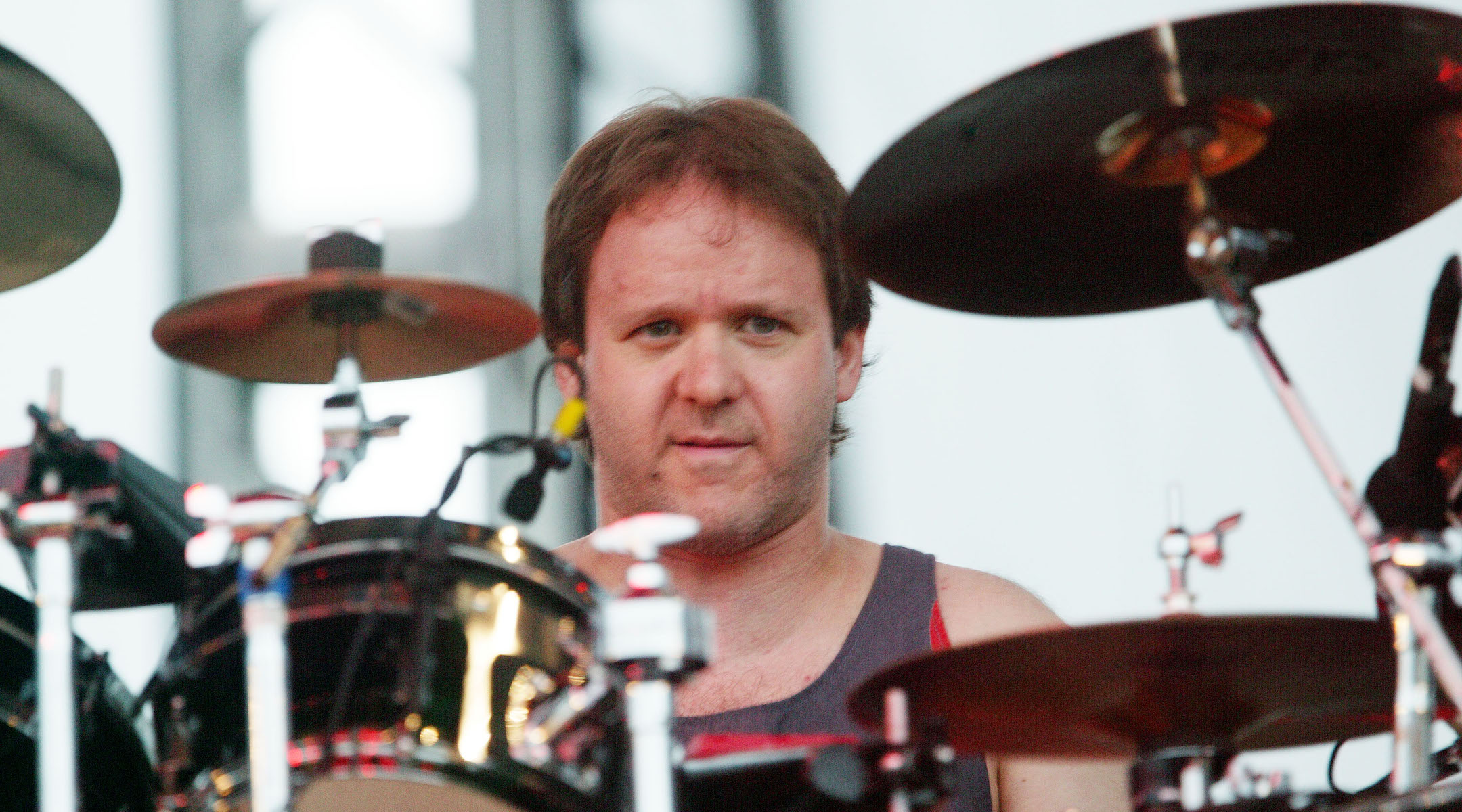 Phish drummer Jon Fishman, shown performing with the band in Brooklyn in 2004, is one of two Jewish members of the group. He’s known for performing in a colorful dress. (Scott Gries/Getty Images)