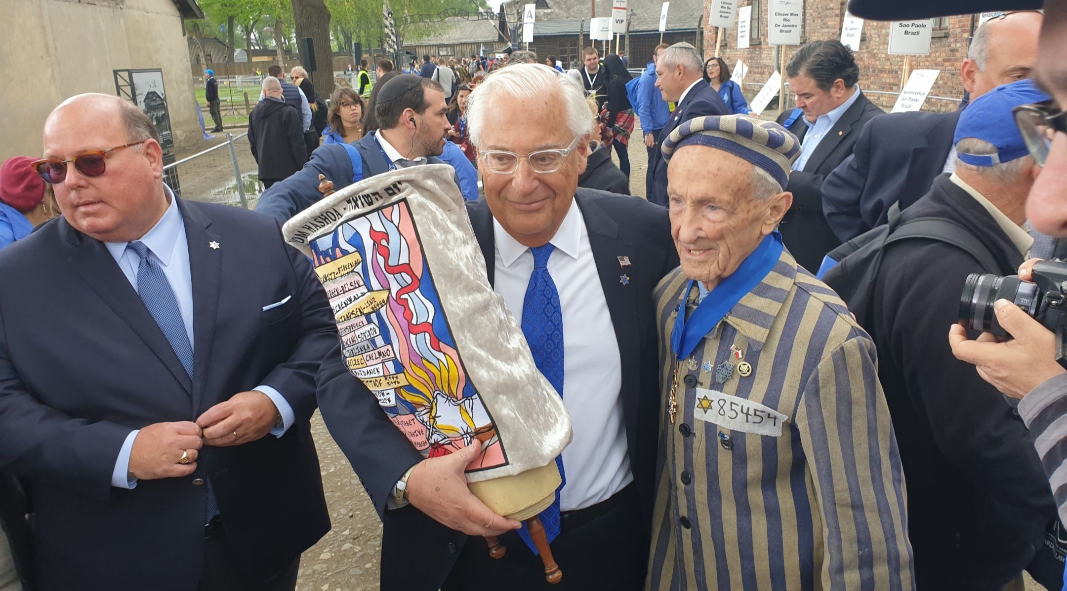 U.S. Ambassador to Israel David Friedman with prominent New Jersey Holocaust survivor Ed Mosberg at the March of the Living at Auschwitz-Birkenau on May 2, 2019. (Cnaan Liphshiz)