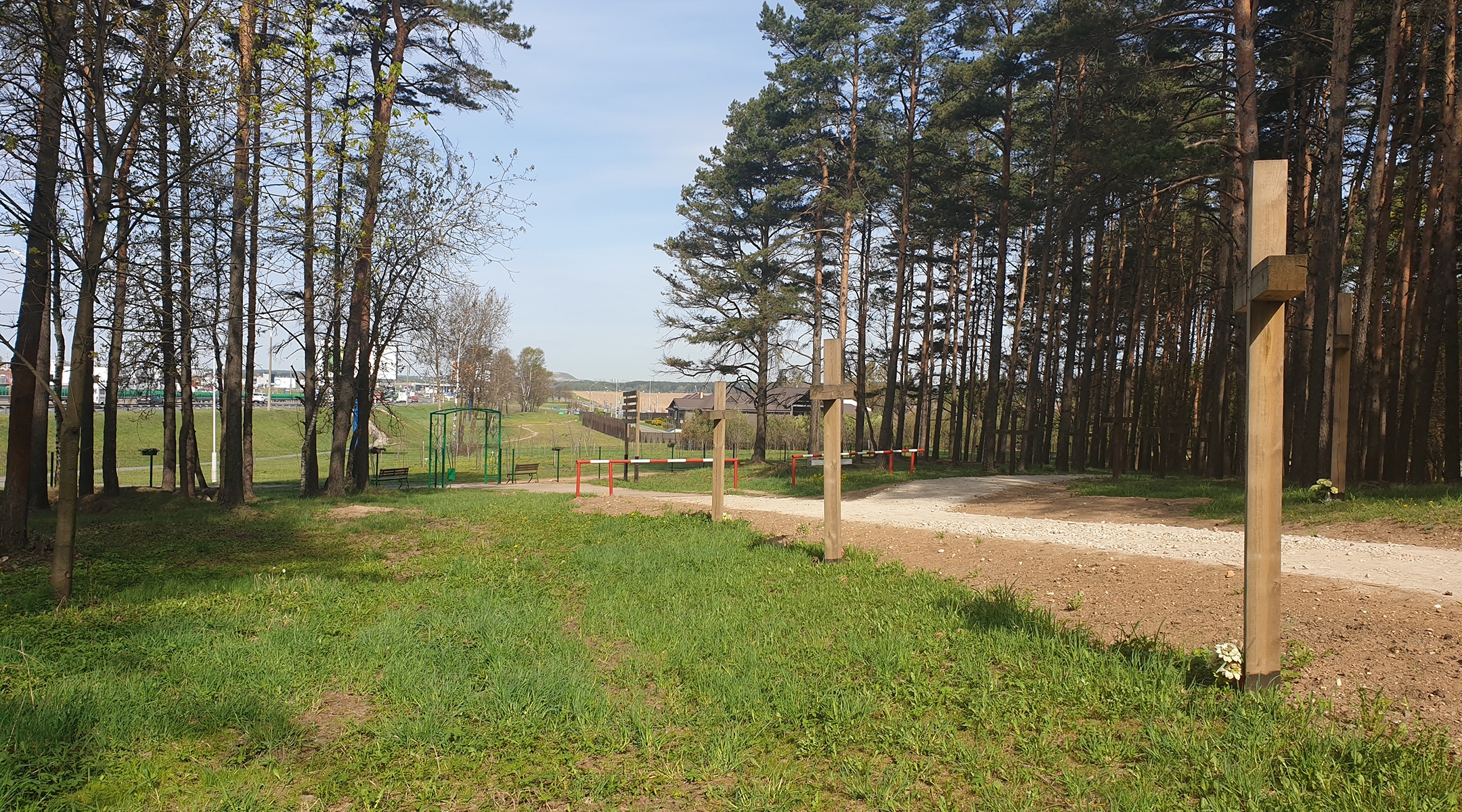 The main avenue at the Kuropaty execution site of victims of Stalinism ends in a new restaurant built in 2018 by Jewish entrepeneurs. (Cnaan Liphshiz) 