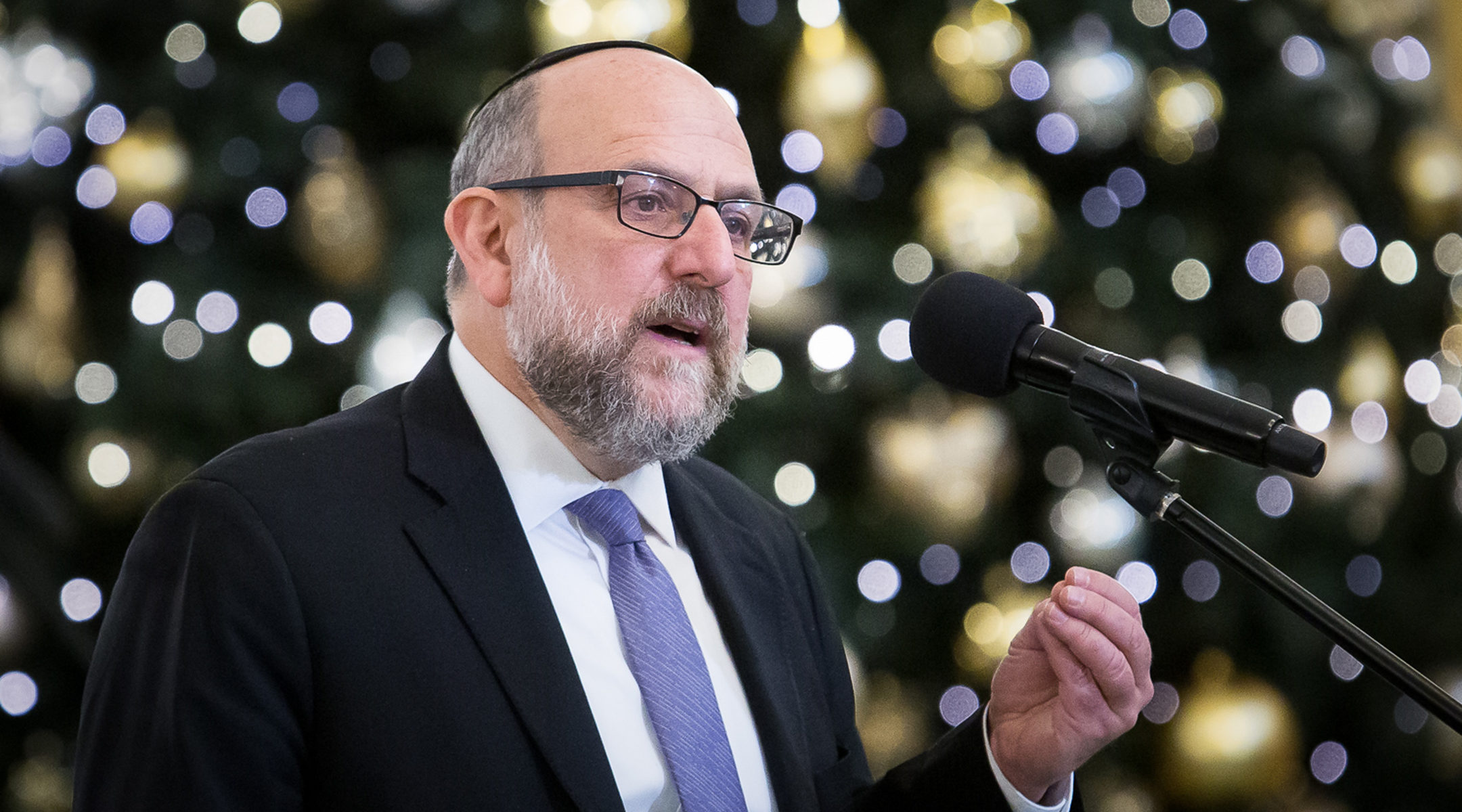 Polish Chief Rabbi Michael Schudrich delivering a speech in Warsaw, Poland on Jan. 2019 (Mateusz Wlodarczyk/NurPhoto via Getty Images)