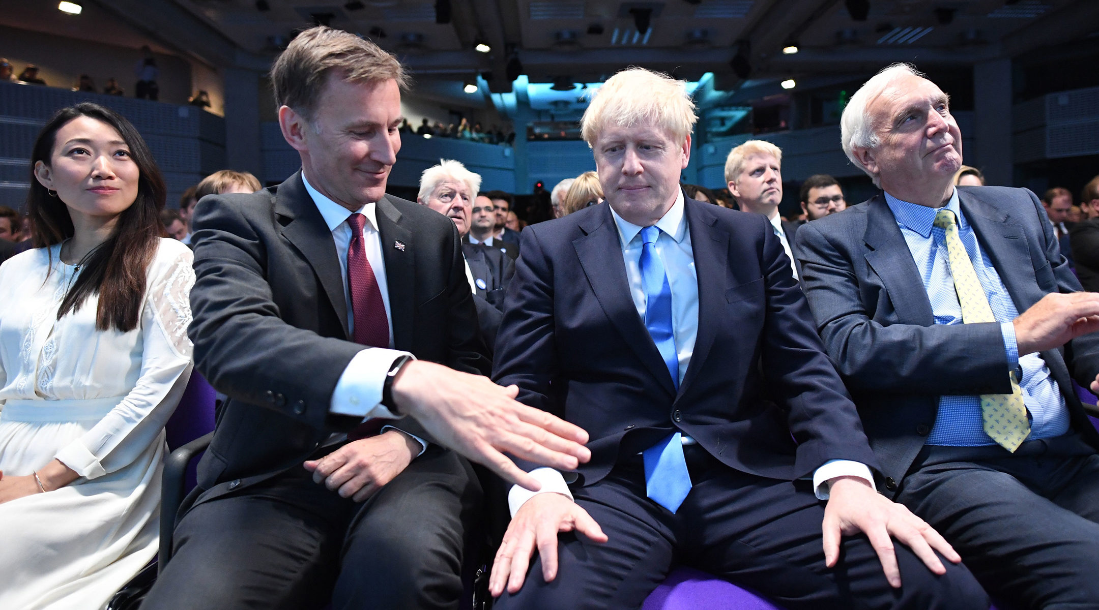 Foreign Secretary Jeremy Hunt, left, extending a hand to congratulate Boris Johnson for being elected as the new leader of the Conservative Party and British Prime Minister in London, the United Kingdom, on July 23, 2019 (Stefan Rousseau - WPA Pool/Getty Images)