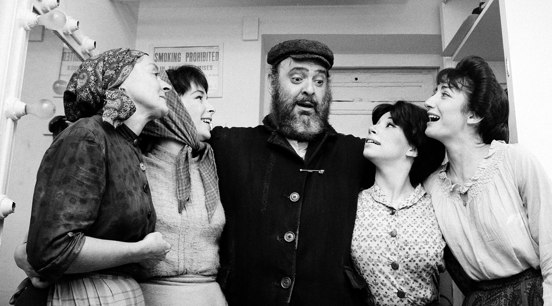 From left: Maria-Karnilova, Tanya Everett, Zero Mostel, Julia-Migenes and Joanna Merlin backstage at opening night of "Fiddler on the Roof" at the Imperial Theater in New York City, Sept. 22, 1964. (AP/Courtesy of Roadside Attractions and Samuel Goldwyn Films)