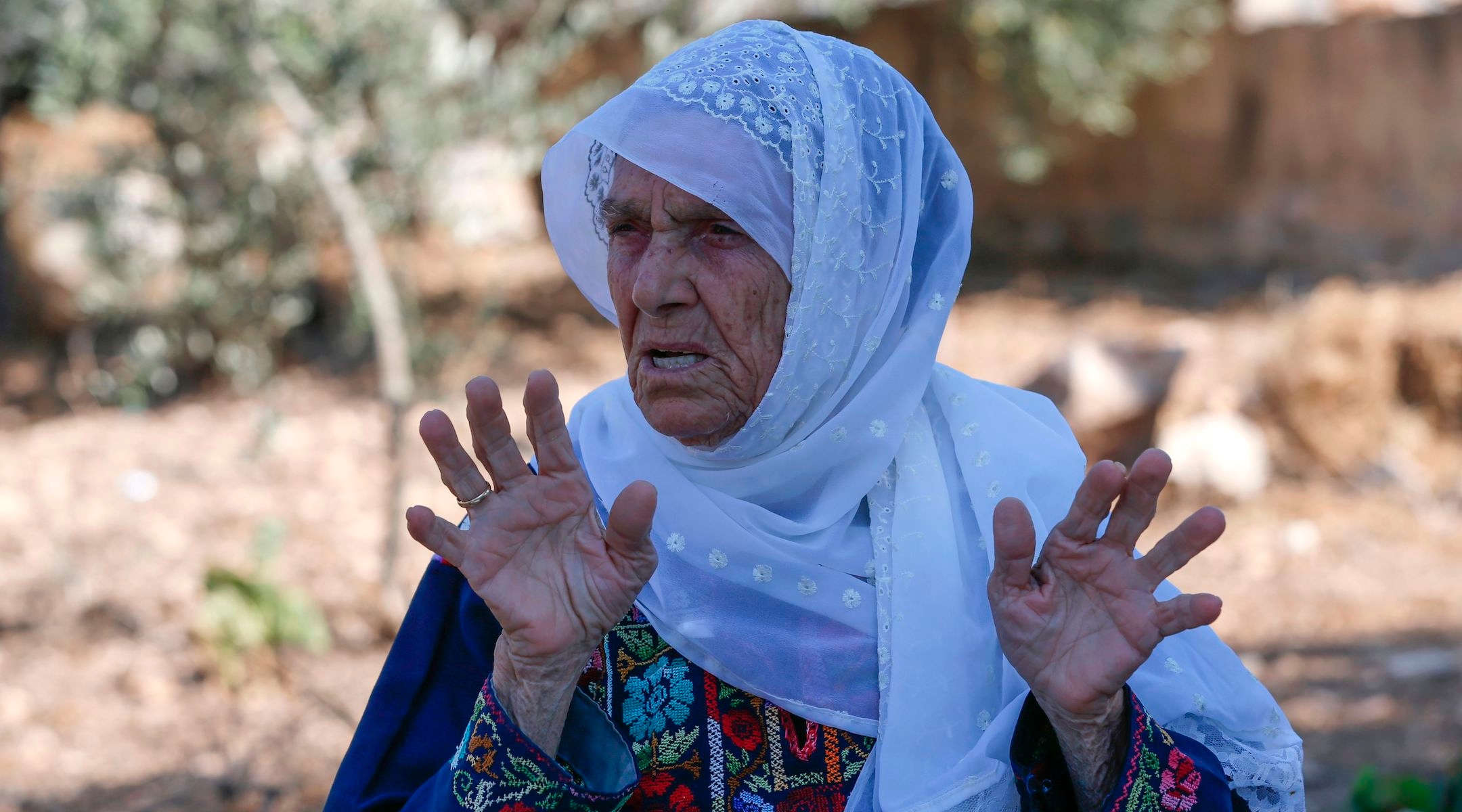 Muftia Tlaib, the maternal grandmother of Rashida Tlaib, pictured outside her home in the village of Beit Ur al-Fauqa, in the West Bank, Aug. 15, 2019. (Abbas Momani/AFP/Getty Images)