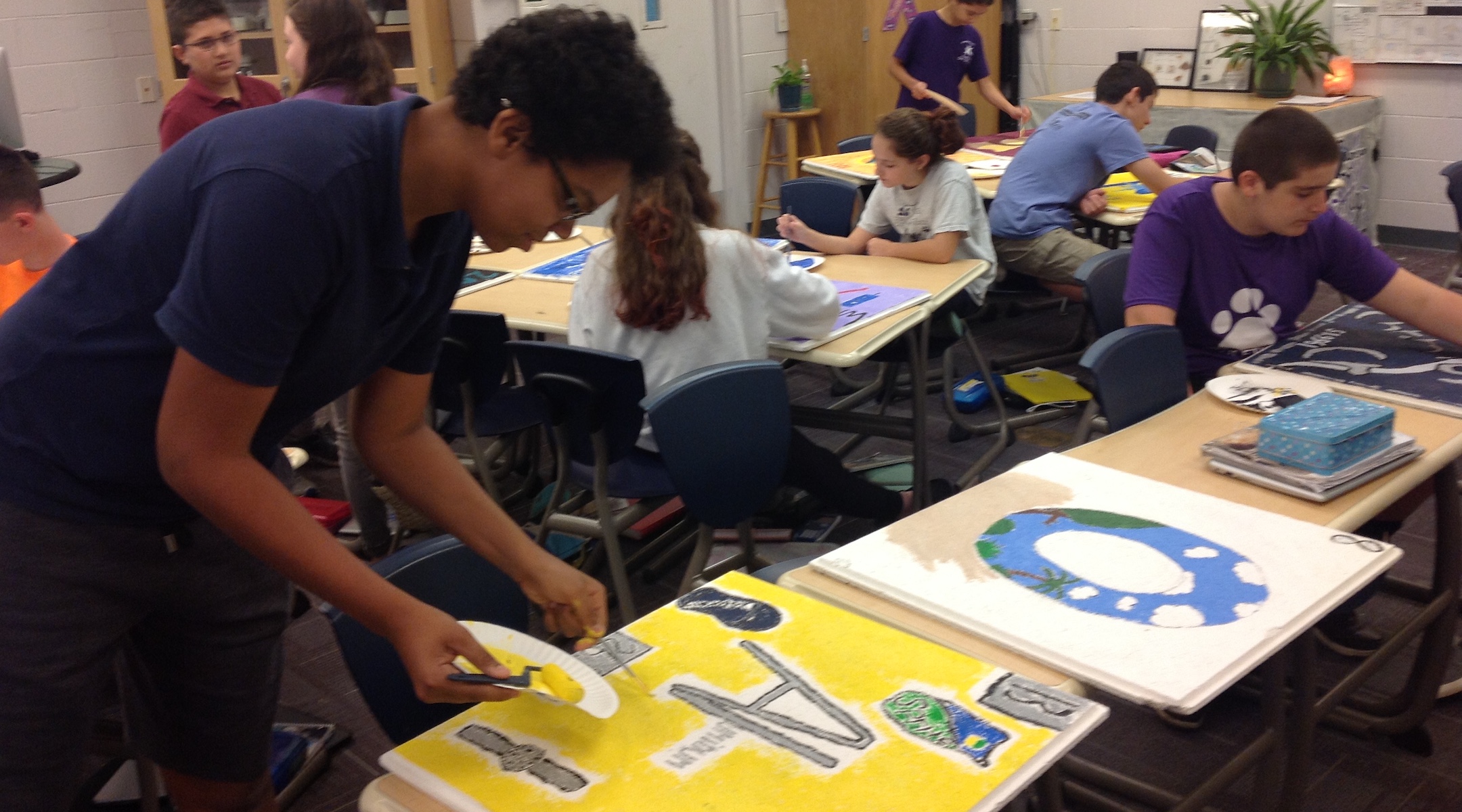 Students at Hershorin Schiff Community Day School in Sarasota, Fla. create panels for the periodic table of elements. (Ben Sales)