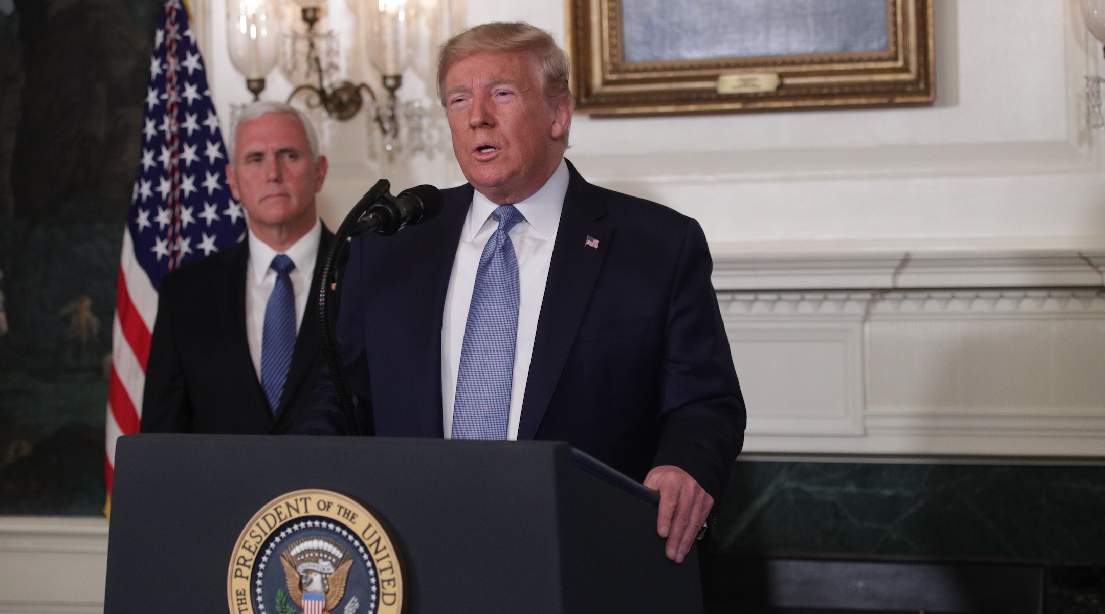 President Donald Trump makes remarks about the mass shootings in El Paso, Tex., and Dayton, Ohio, in the Diplomatic Reception Room of the White House as Vice President Mike Pence, Aug. 5, 2019. (Alex Wong/Getty Images)