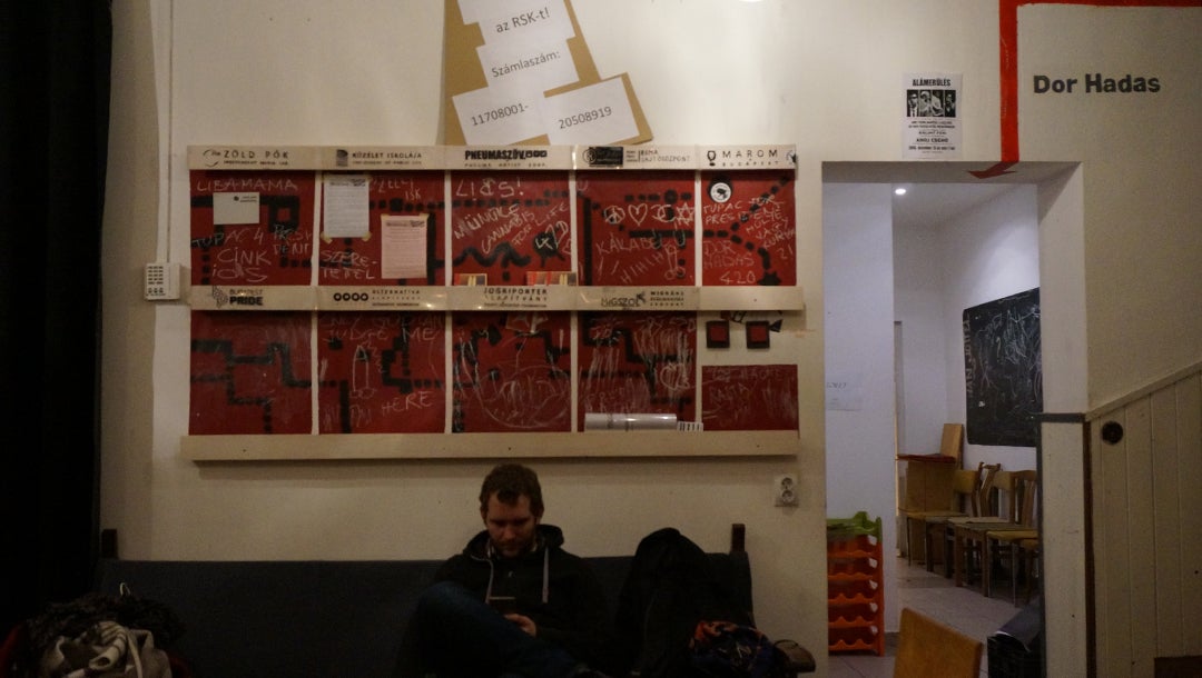 A man reading his cellphone at the Aurora center in Budapest, Hungary on Jan. 12, 2017. (Cnaan Liphshiz)