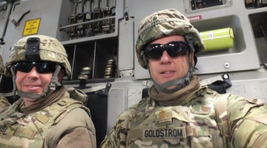 Goldstrom (right) with his chaplain assistant in Afghanistan, Sgt Teakull, while riding to visit military personnel at other bases and outposts in 2013. (Courtesy of Goldstrom)