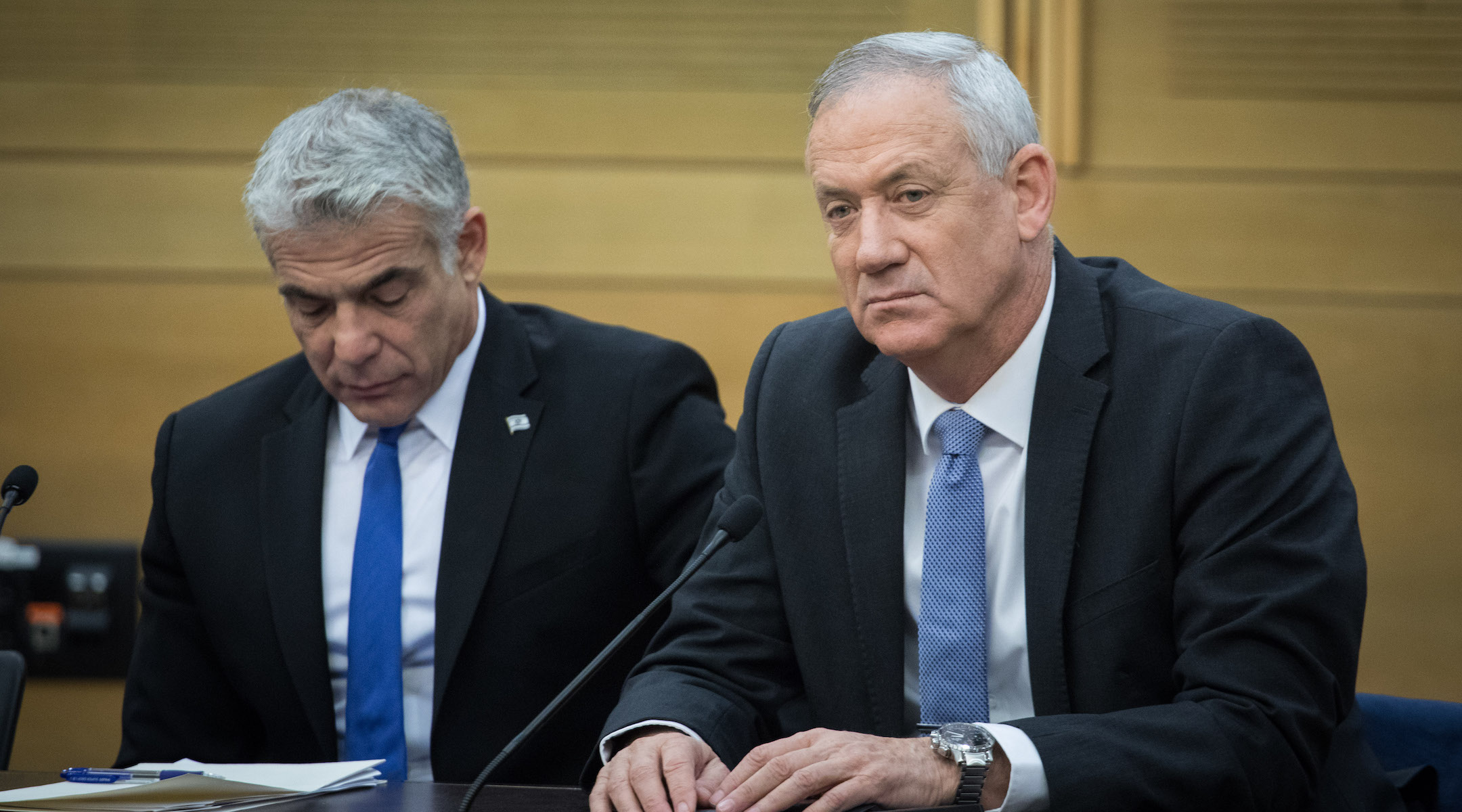 Blue and White party chairmen Benny Gantz and Yair Lapid during a faction meeting at the Knesset, the Israeli parliament in Jerusalem, Nov. 18, 2019. (Hadas Parush/Flash90)
