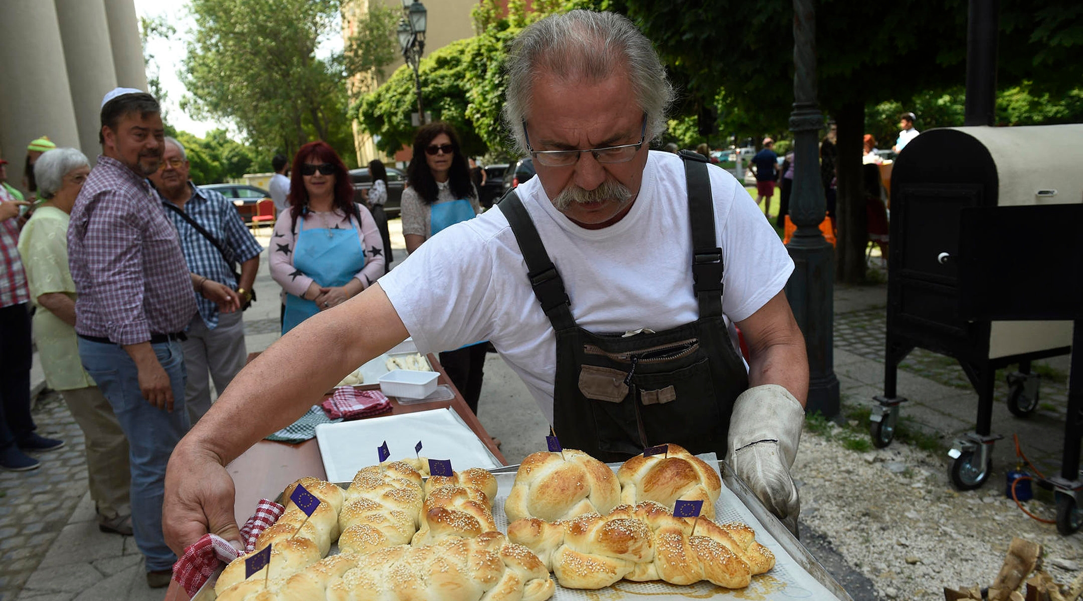 Hungarian Jews baking challah breads in front of the Obuda Synagogue in Budapest, Hungary on Oct. 7, 2019. (Courtesy of EMIH)