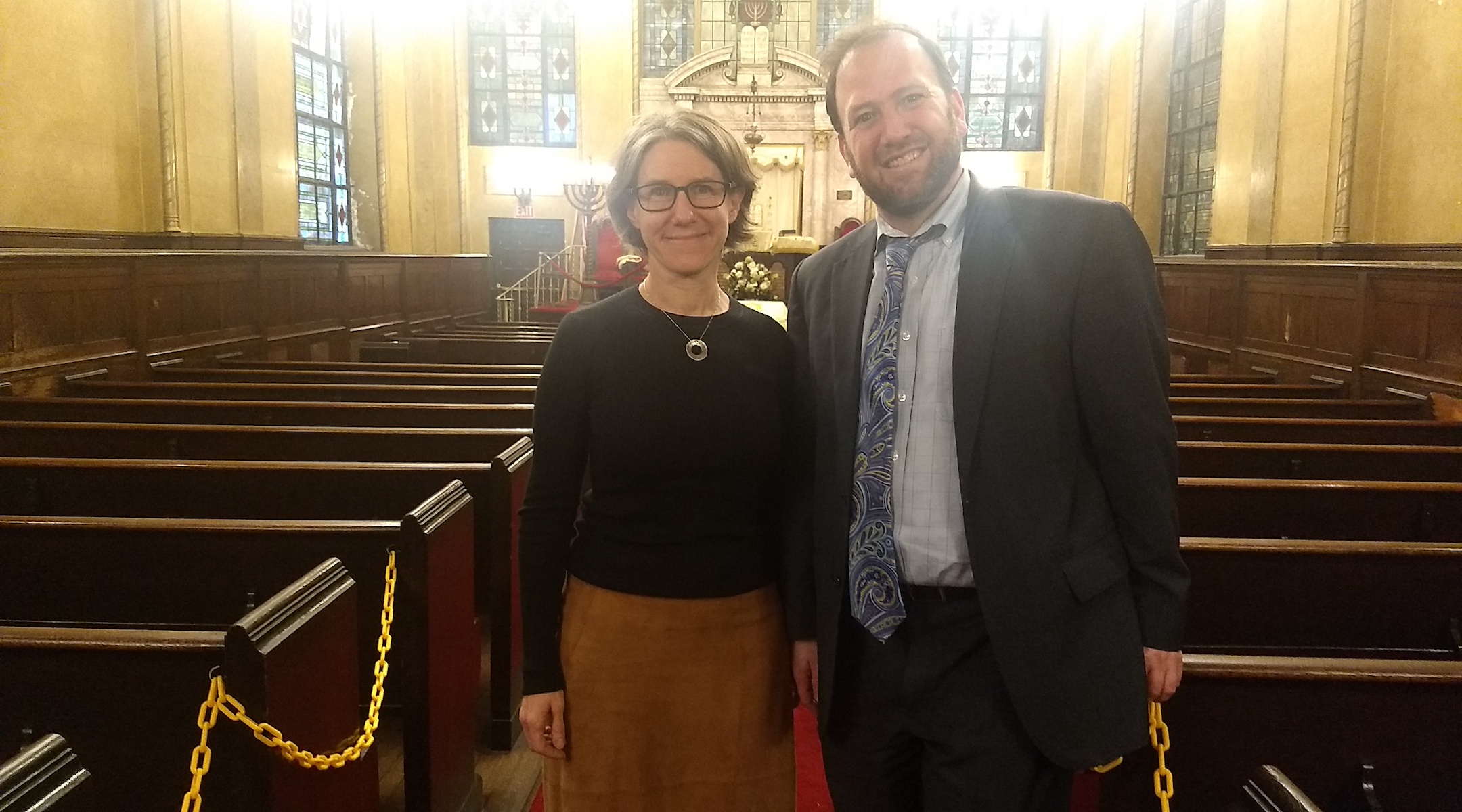 Rabbi Jason Herman and architect Esther Sperber stand in the sanctuary of the West Side Jewish Center. (Ben Sales)