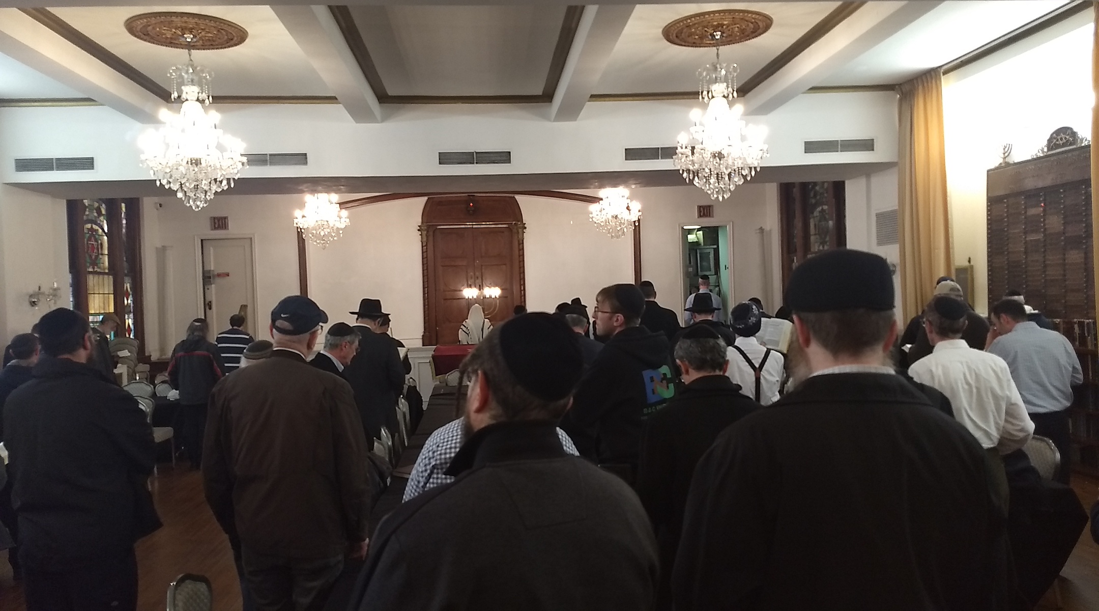 The afternoon prayer service, held in the West Side Jewish Center's multipurpose room, is one of the synagogue's busiest times of day. (Ben Sales)