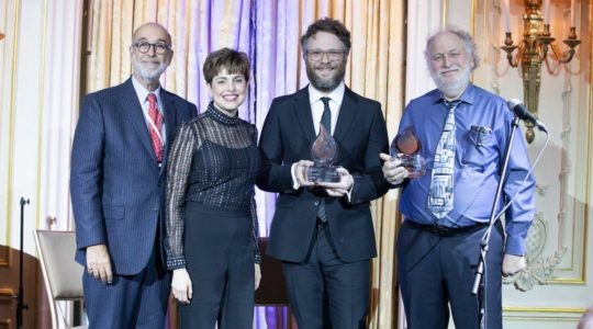 From left: Rich Rumelt, the board president of The Workers Circle; Ann Toback, the group's executive director; Seth Rogen; and Mark Rogen at the organization's ceremony in New York City, Dec. 2, 2019. (Mark Stephen Kornbluth)