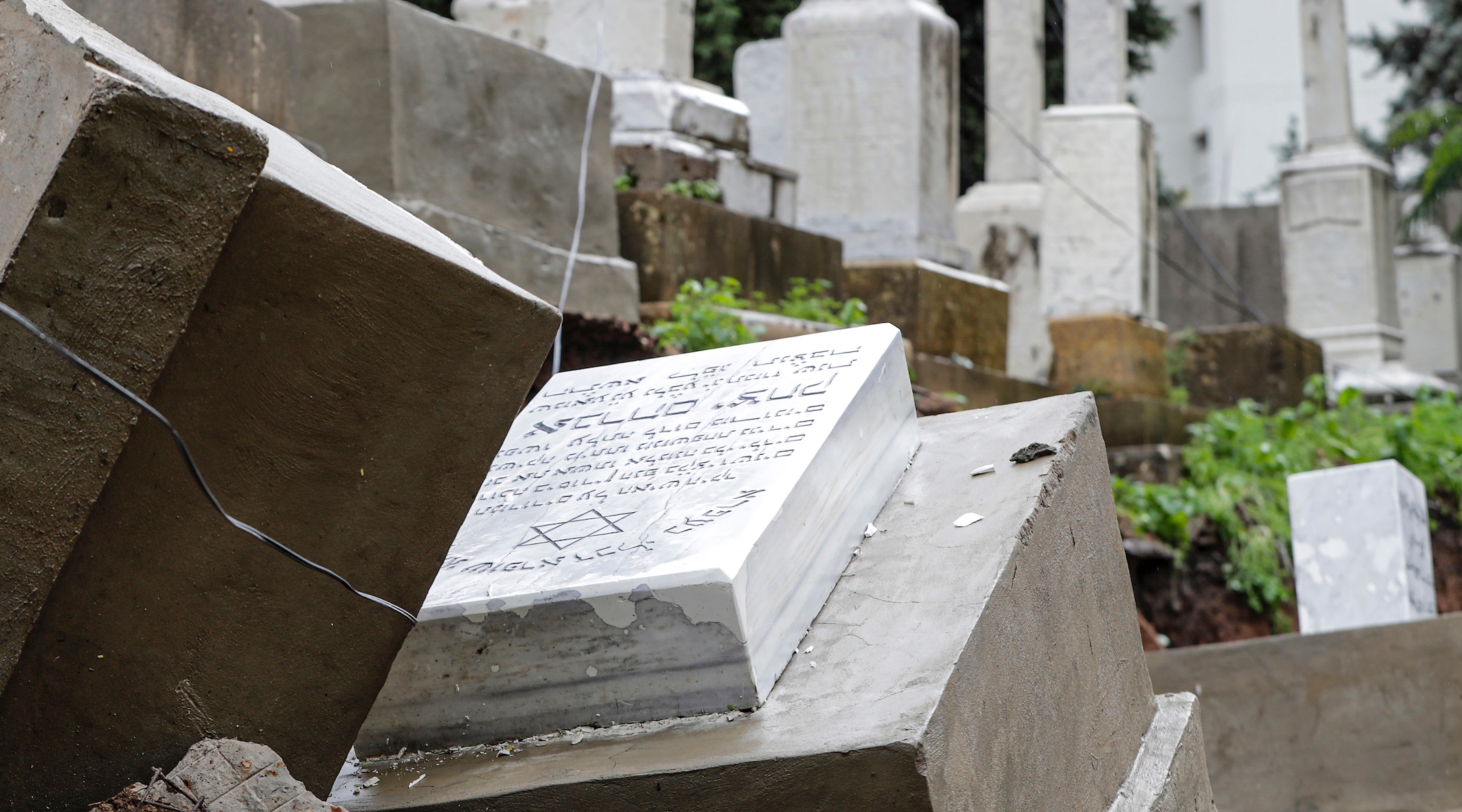 Damaged graves following a winter storm at the Jewish cemetery in Beirut. (Anwar Amro/Getty Images)