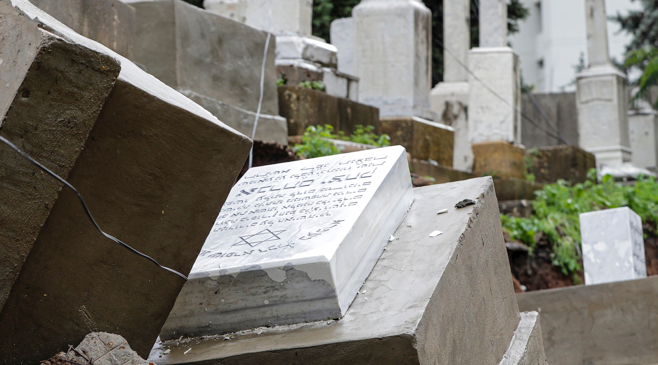 Damaged graves following a winter storm at the Jewish cemetery in Beirut. (Anwar Amro/Getty Images)