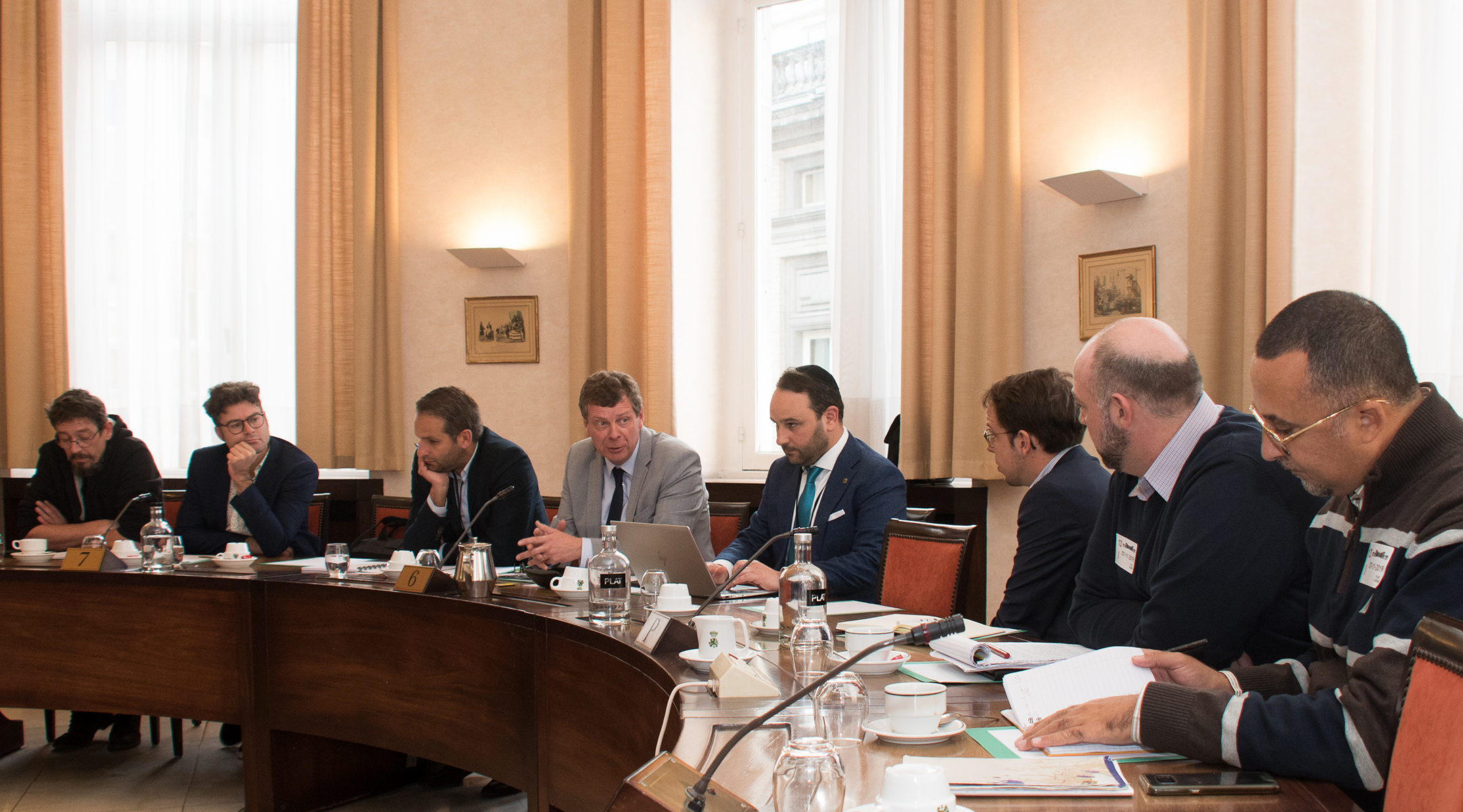 Michael Freilich, wearing a kippah, attending a meeting with federal lawmakers and pro-Palestinian activists in Brussels, Belgium on Nov, 7, 2019. (Inge Verhelst/Belgian Federal Parliament)