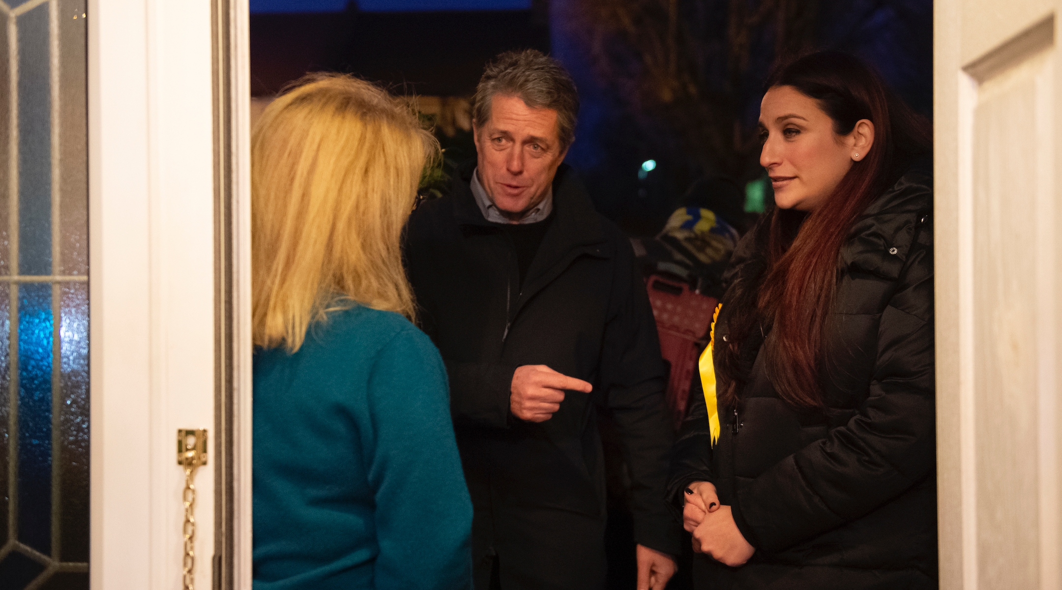 Hugh Grant, left, canvassing in Finchley, London, with Liberal Democratic parliament candidate Luciana Berger, right, Dec. 1, 2019. (David Mirzoeff/PA Images via Getty Images)