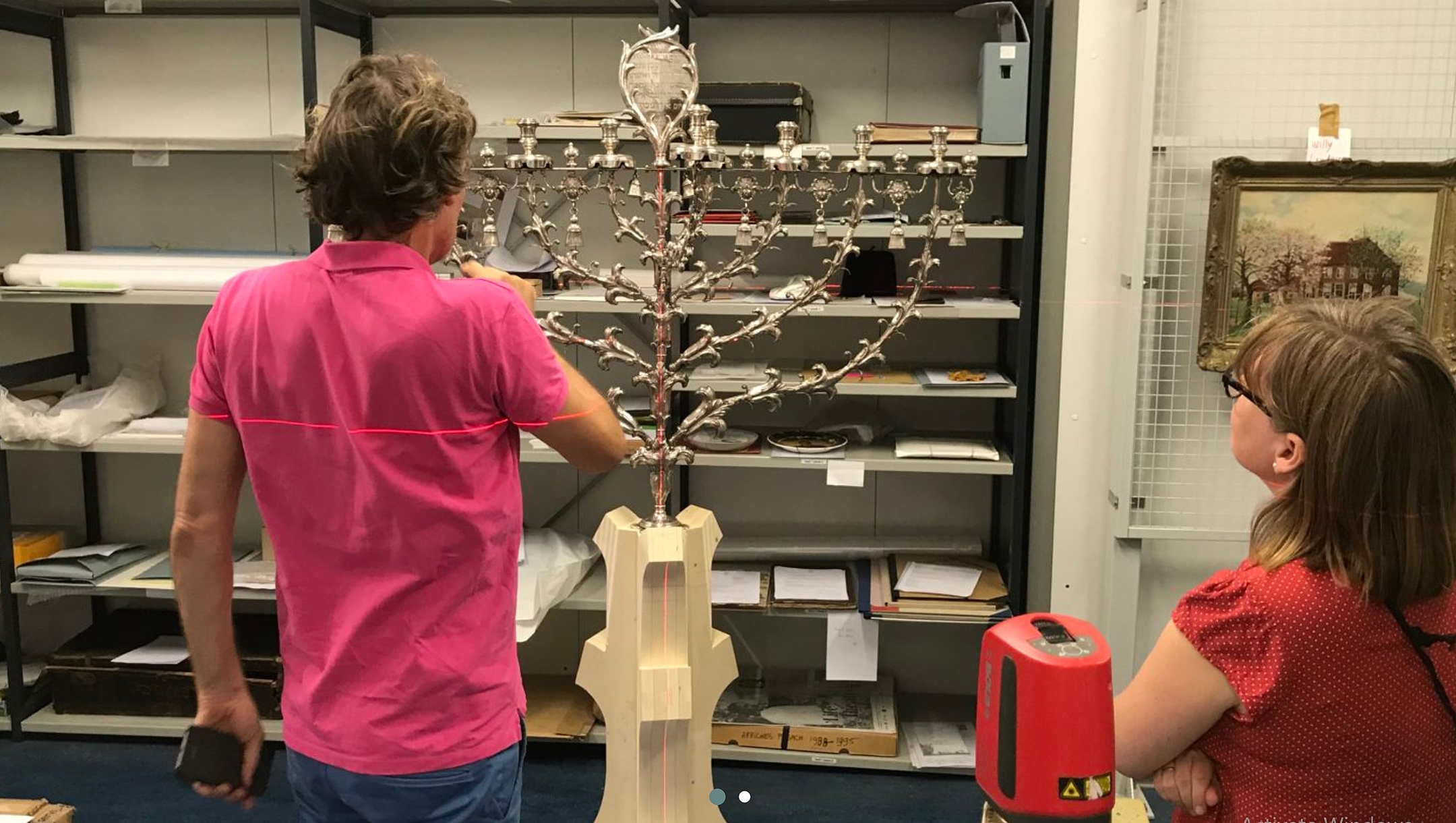 Restoration work and measurements being done on the Rintel Menorah in Amsterdam, the Netherlands in 2019. (Courtesy of Cambium Meubels)