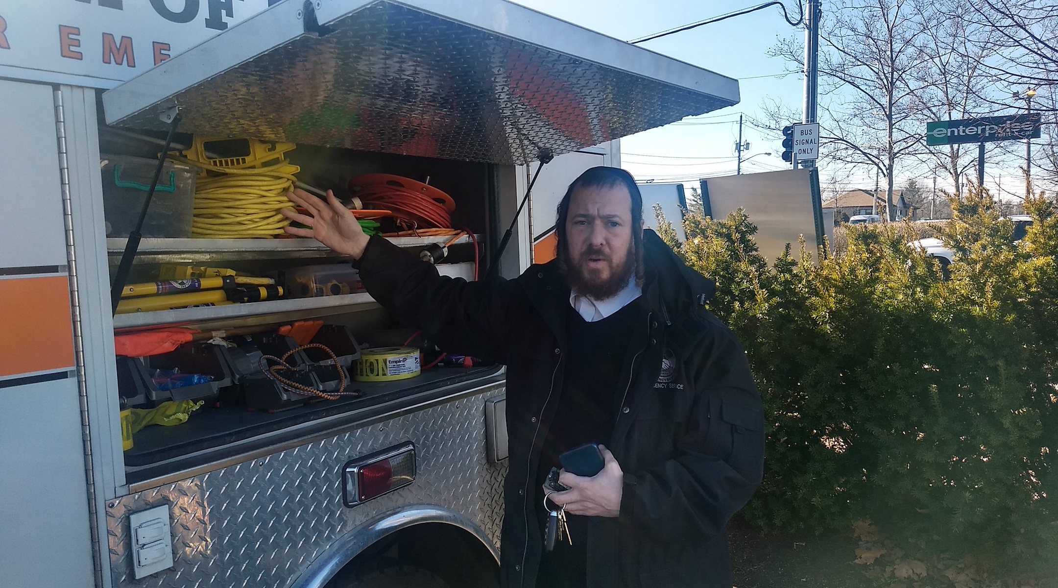 Josef Margaretten, the coordinator of Chaverim of Rockland, displays some of the emergency services agency's equipment. (Ben Sales)