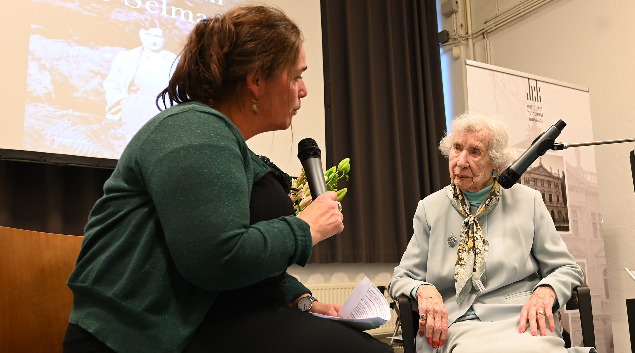 Selma van de Perre, right, being interviewed about her book at the National Holocaust Museum in Amsterdam, the Netherlands on Jan. 9, 2020. (Cnaan Liphshiz)