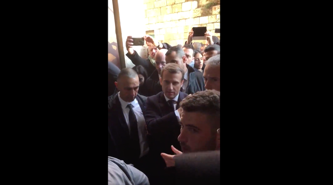 Emmanuel Macron yelled at police officers escorting him to a church in Jerusalem, Jan. 22, 2020. (Ava Djamshidi/Twitter)