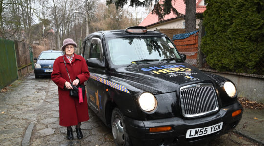 nna Stupnicka-Bando, the 90-year-old president of the Polish Association of the Righteous Among the Nations, entering one of the From the Depths taxis for saviors of Jews in Warsaw, Poland on Jan. 29, 2020. (Cnaan Liphshiz)