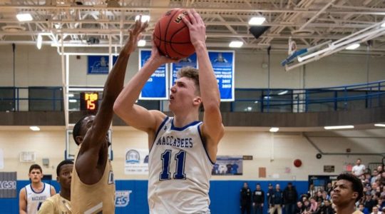 Ryan Turell playing basketball