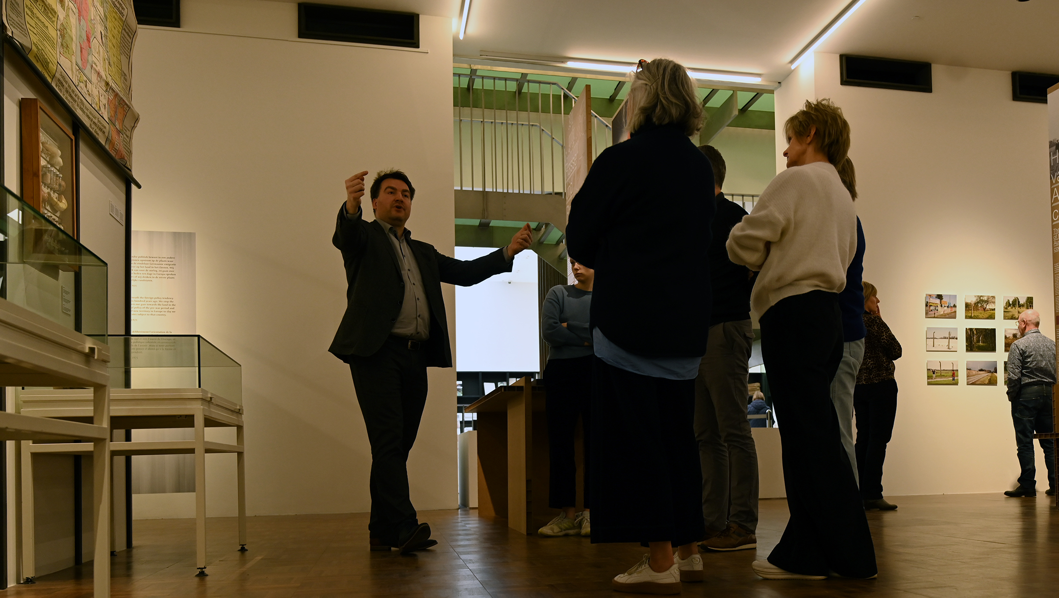 A guide explainign about Auschwitz at the Kazerne Dossin Holocaust museum in Mechelen, Belgium on Dec. 22, 2019. (Cnaan Liphshiz)