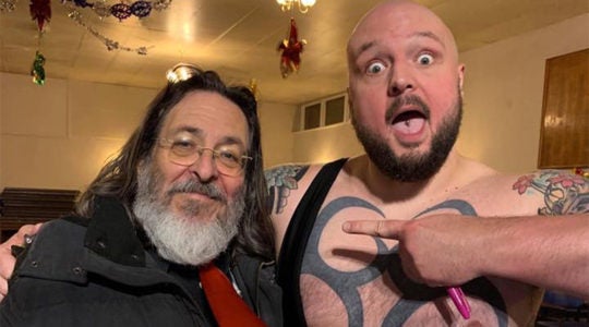 Rabbi Neil Kraft, left, with wrestler Crusher Curtis in London. (Courtesy of Crusher Curtis)