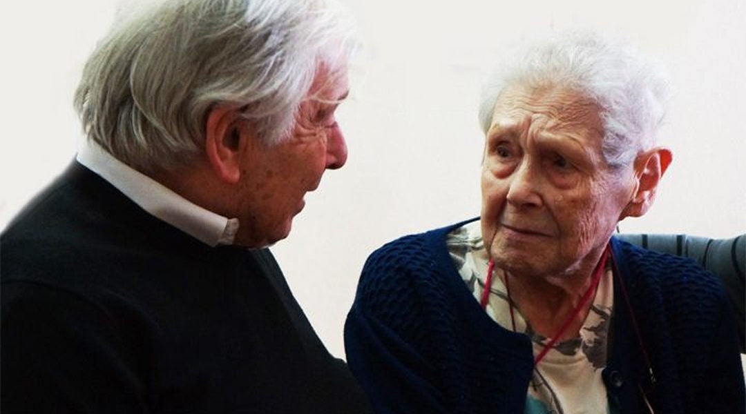 Frida Wattenberg speaking with her brother, Charles Smiétanski, at the Memorial for the Shoah in Paris, France on Jan. 29, 2019. (Courtesy of the Memorial for the Shoah)