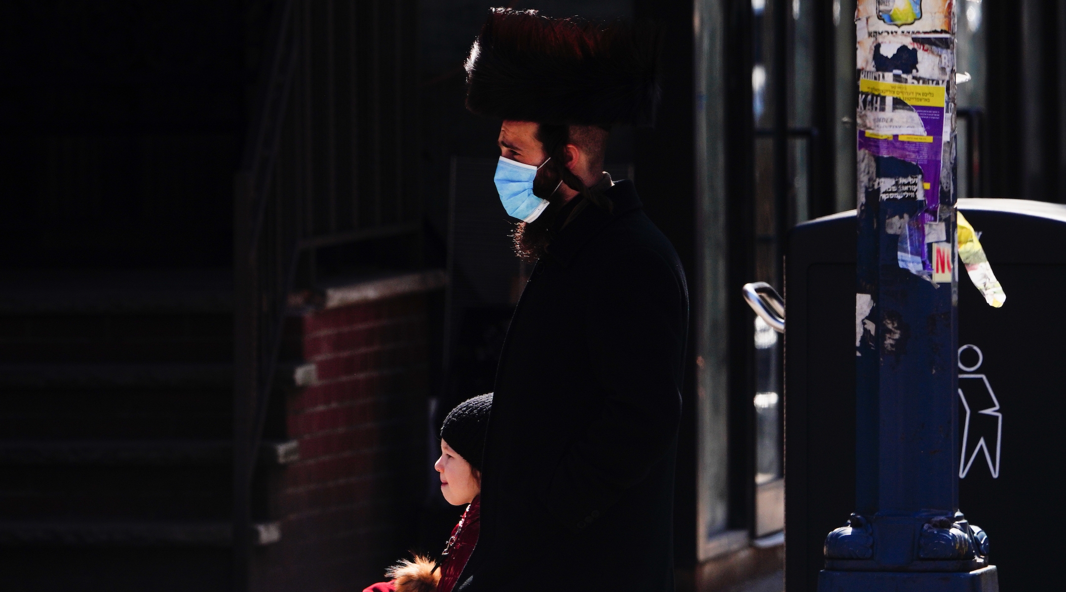 Orthodox Jews walking on the street in Williamsburg on April 11, 2020. (John Nacion/NurPhoto via Getty Images)