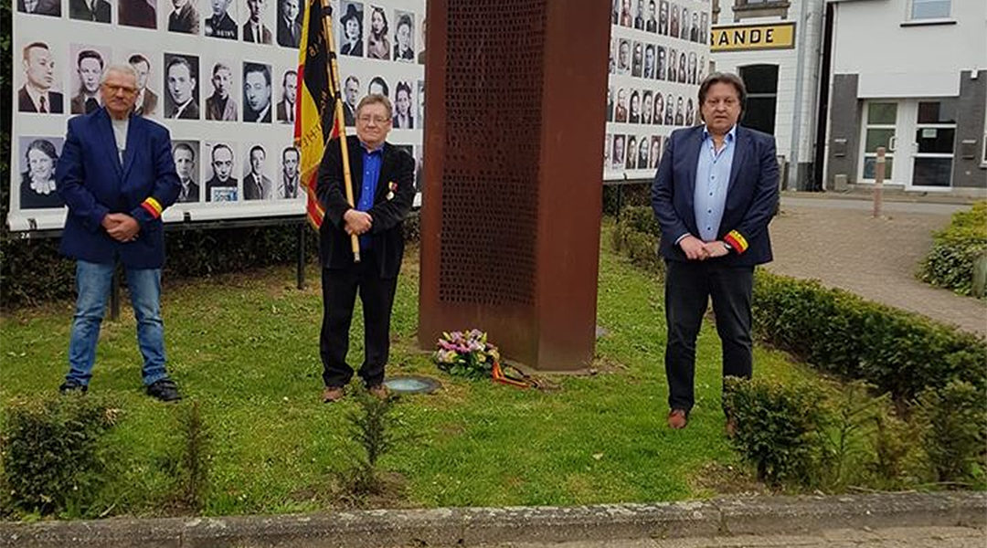 Michel Baert, right, and two commemoration activists laying a wreath at a Holocaust monument in Boortmeerbeek, Belgium on April 19, 2020. (Michel Baert)