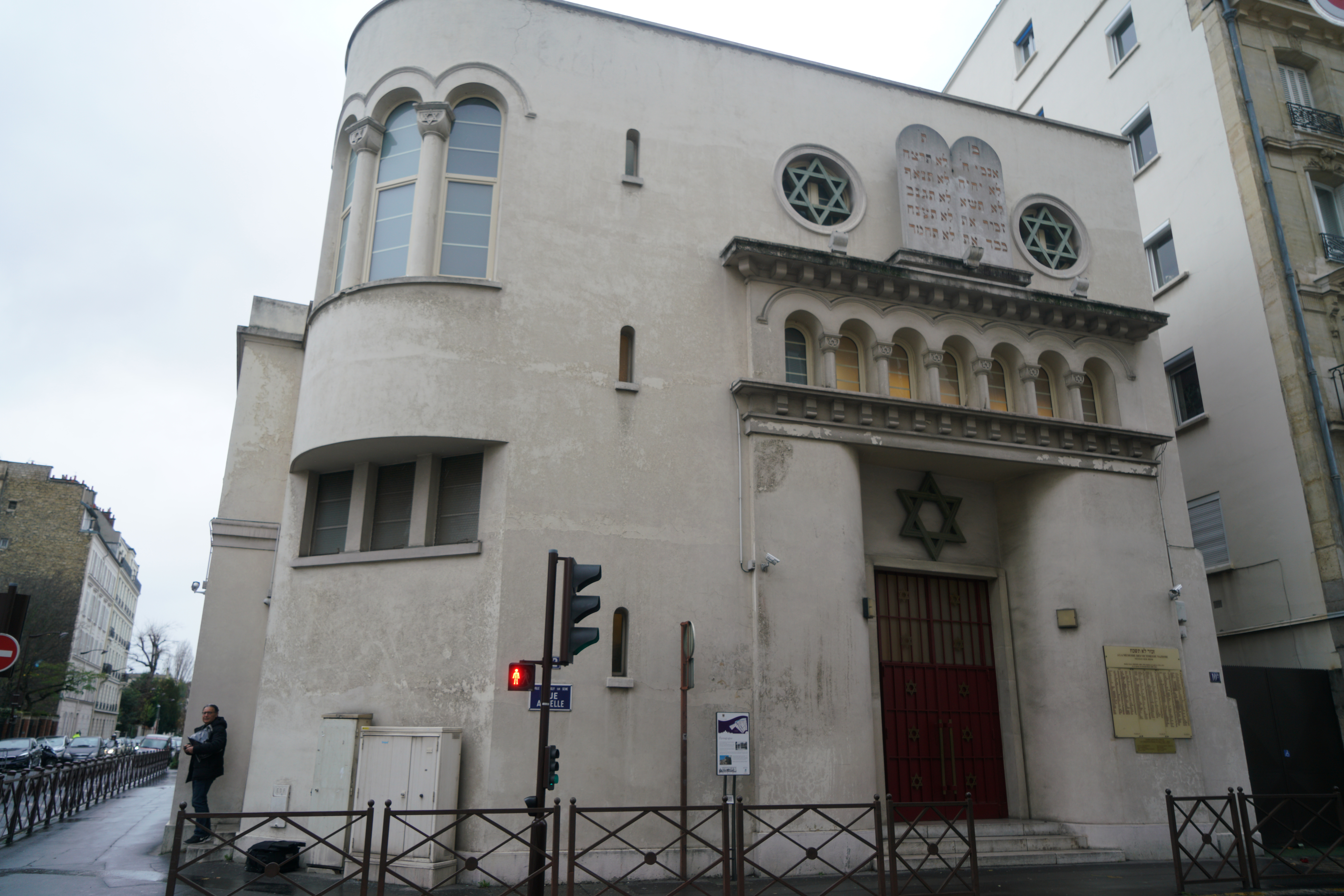 A mans leaving the synagogue of Neuilly-sur-Seine, France on Dec. 11, 2017. (Cnaan Liphshiz)