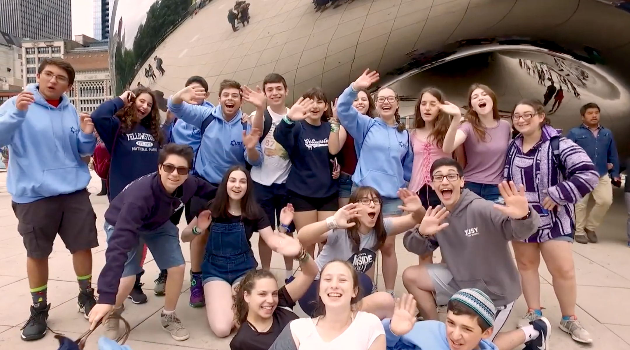 A group of USY members on a visit to Millennium Park in Chicago. (Screenshot from YouTube)