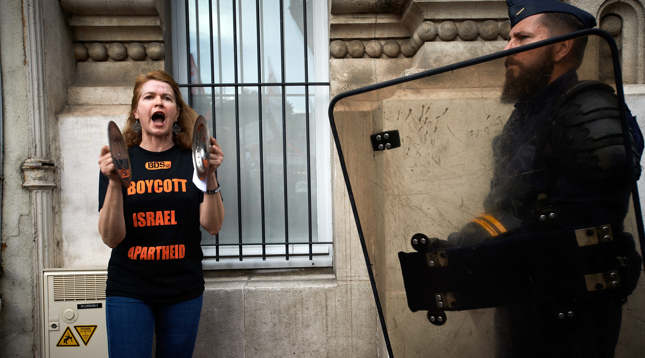 A protester shouts slogans in front of the Chamber of Commerce and Industry of Toulouse in protest to the coming of the Israël's ambassador in France, Aliza Ben-Noun, on May 23, 2018. (Alain Pitton/NurPhoto via Getty Images)