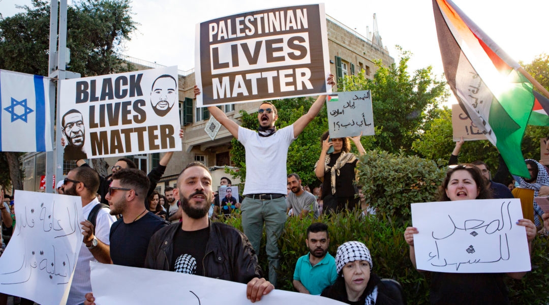 Hundreds of demonstrators in Haifa protest the recent Israeli police killing of an unarmed autistic Palestinian man, Iyad el-Hallak, on Tuesday, June 2 , 2020. Protesters in Israel and the United States have sought to link police violence in both countries. (Mati Milstein/NurPhoto via Getty Images)