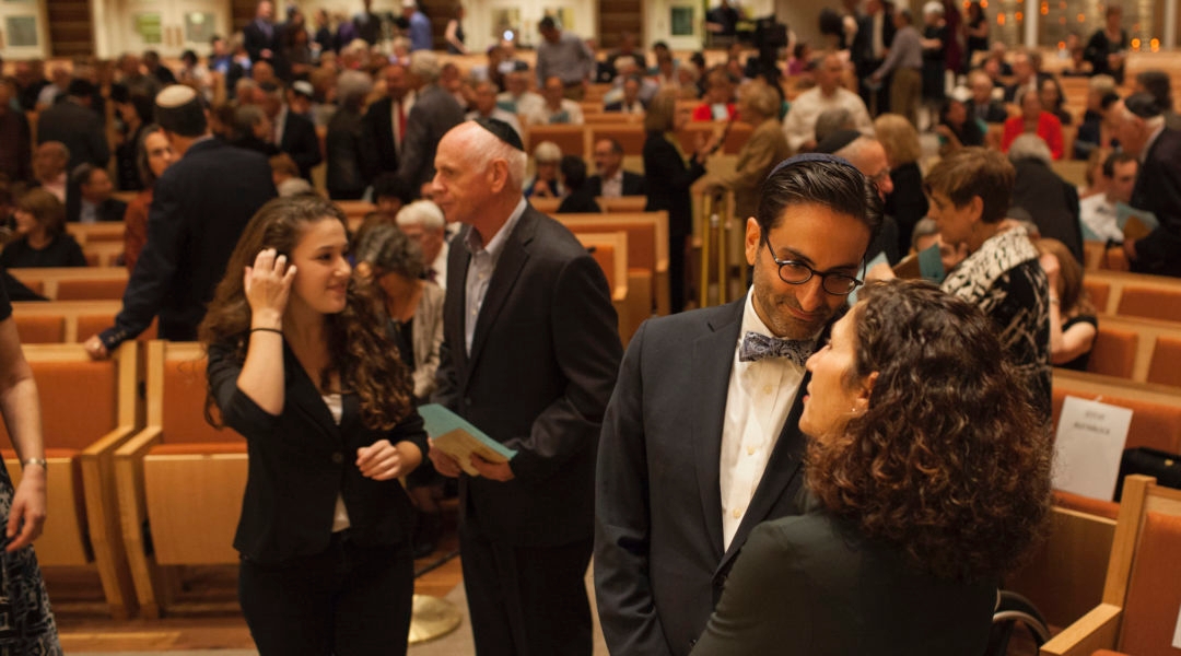 People crowd the sanctuary of Adas Israel Congregation, a Washington, D.C., Conservative synagogue, for a buidling dedication ceremony on October 2, 2013. The synagogue is maintaining its annual dues this year but expects a budget shortfall. (Jared Soares/The Washington Post via Getty Images)