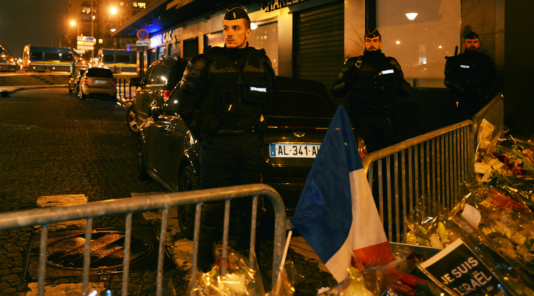 Police officers guard the scene of the Hyper Cachere terrorist attack in Paris, France on Jan. 10, 2015. (Cnaan Liphshiz)