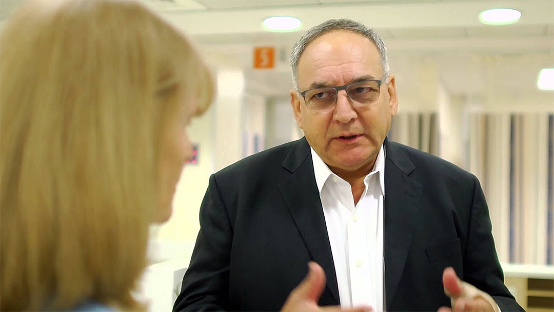 Dr. Zeev Rotstein speaks to journalist Ellen Hershkinin at Hadassah Hospital in Jerusalem, Israel in 2016. (Hadassah International/YouTube)