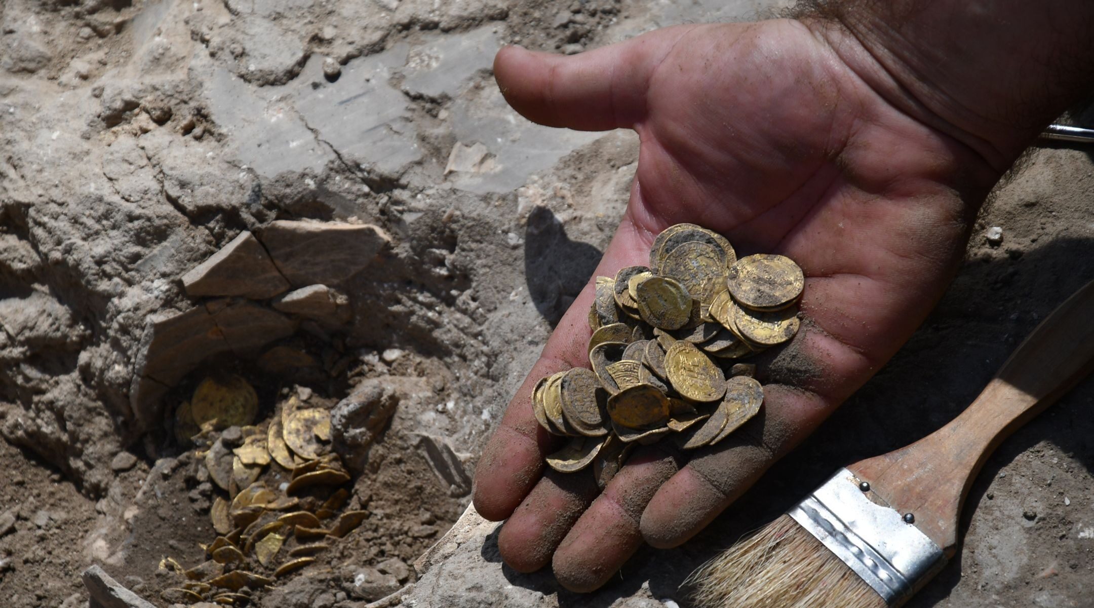 Dozens of pure gold coins discovered in secret cache dating from Muslim  conquest