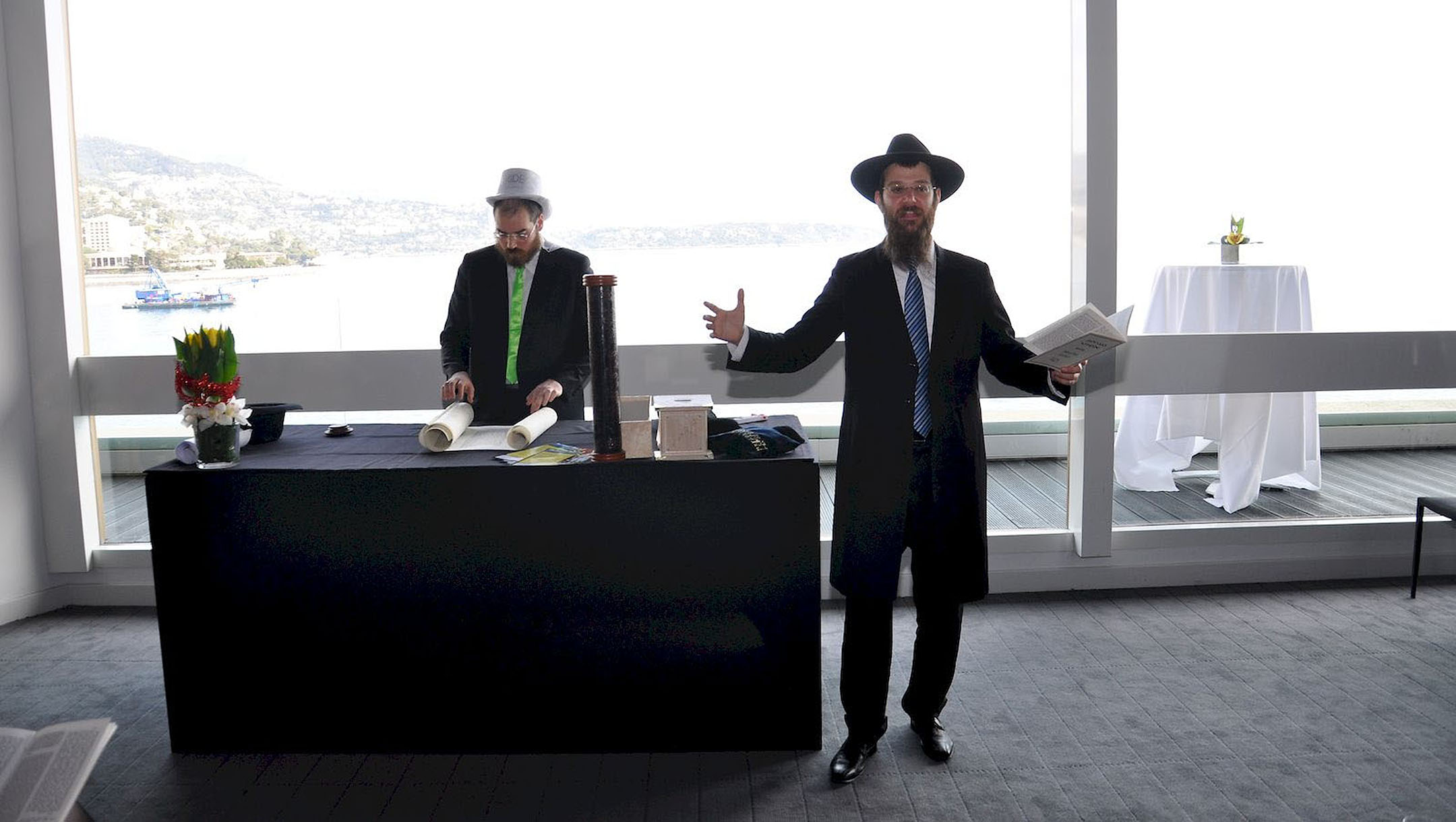 Rabbi Tanhoum Matusof reads from the Book of Esther on Purim in Monaco on Feb. 28, 2018. (Courtesy of the Jewish Cultural Center of Monaco)