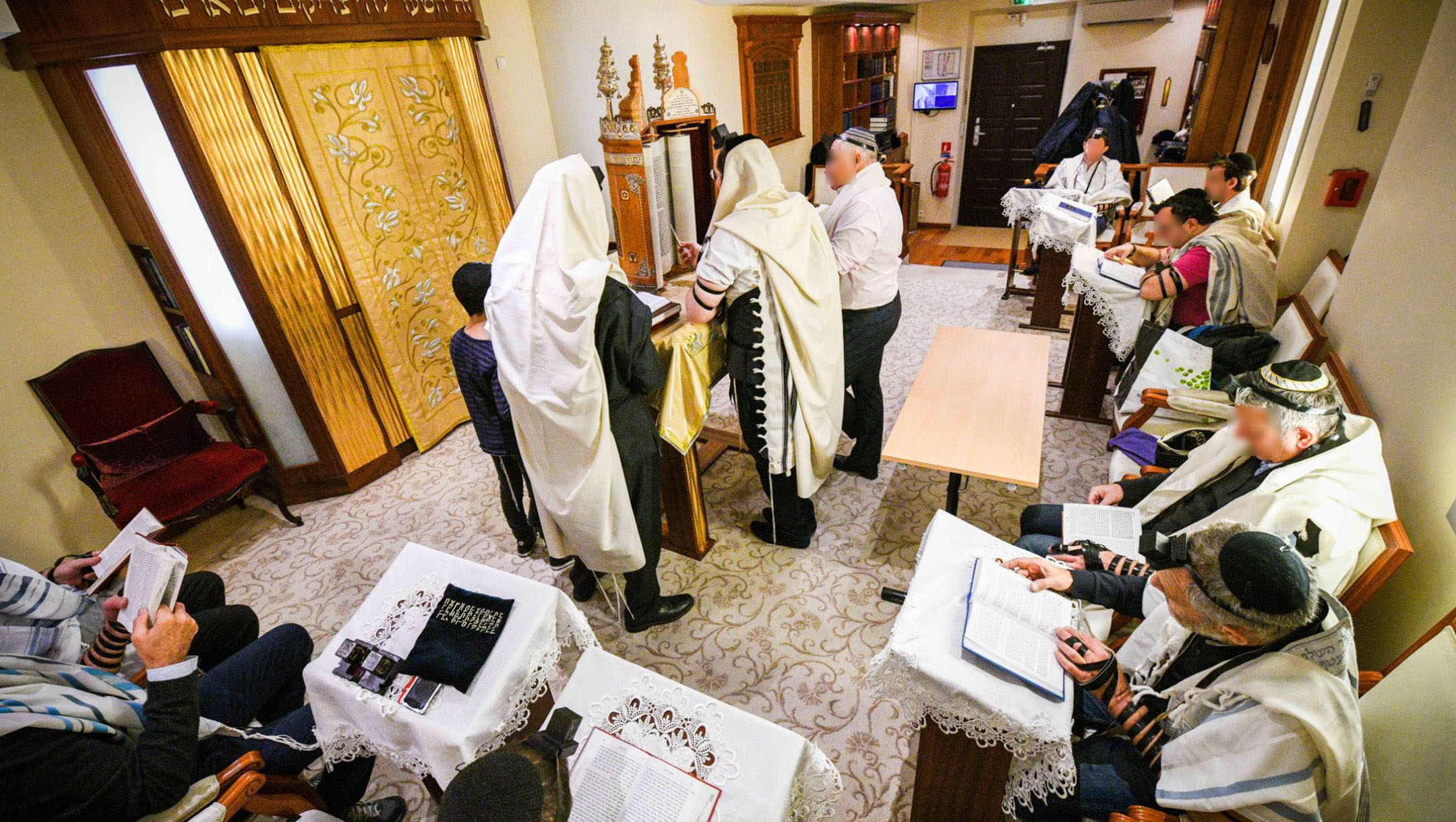 Jews pray at the Jewish Cultural Center of Monaco in 2018. (Courtesy of Rabbi Tanhoum Matusof)