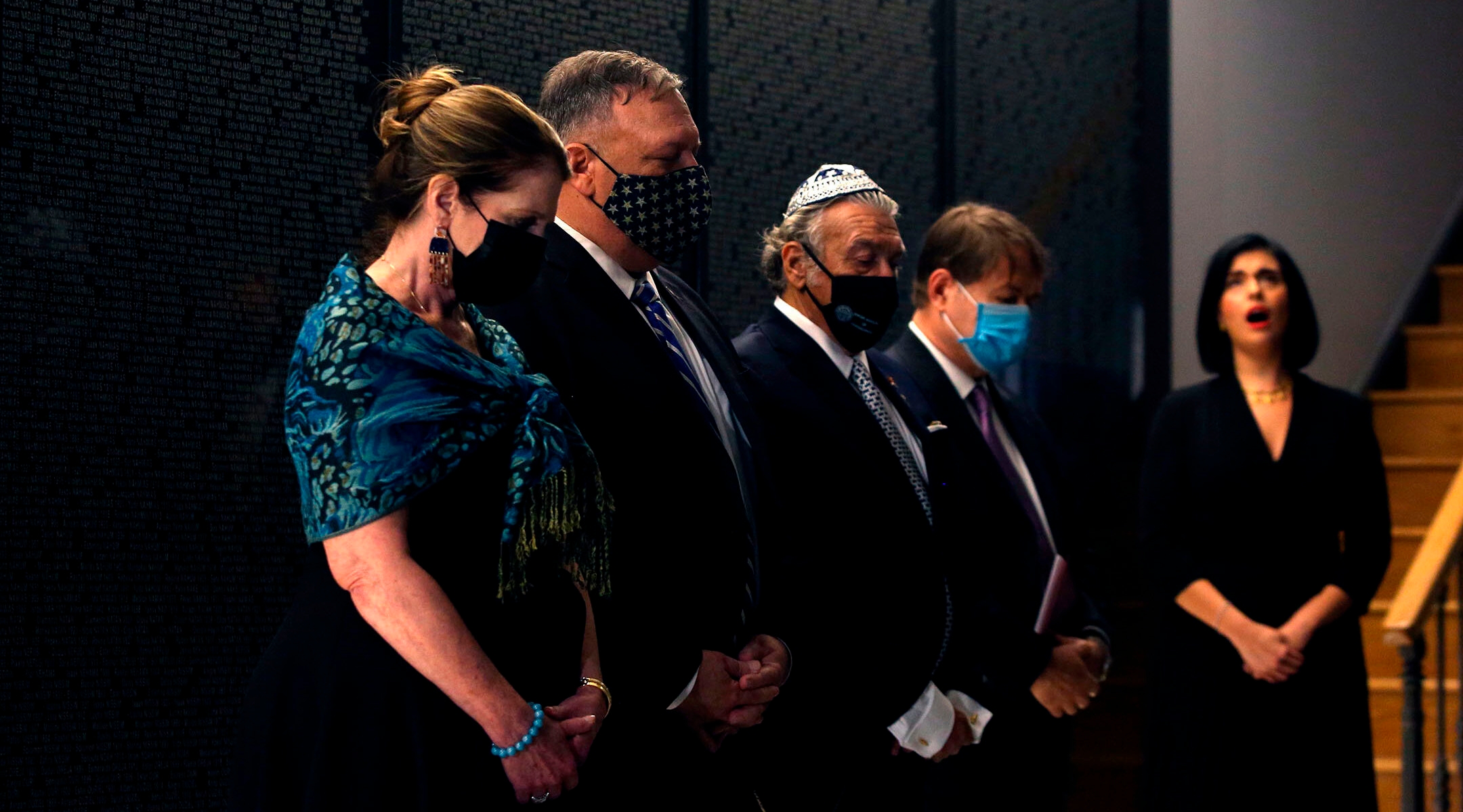 U.S. Secretary of State Mike Pompeo and his wife, Susan, left, visit the Jewish Museum of Thessaloniki, Greece with members of the local Jewish community on Sept. 28, 2020. (Giannis Papanikos/AFP via Getty Images)