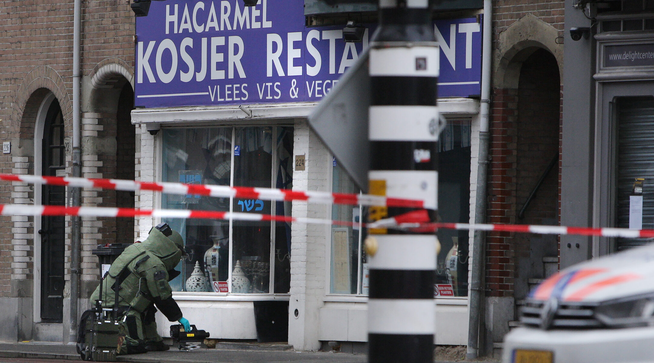 Police investigate a suspect package outside the kosher HaCarmel restaurant in Amsterdam, the Netherlands on January 15, 2020. (Paulo Amorim/NurPhoto via Getty Images)