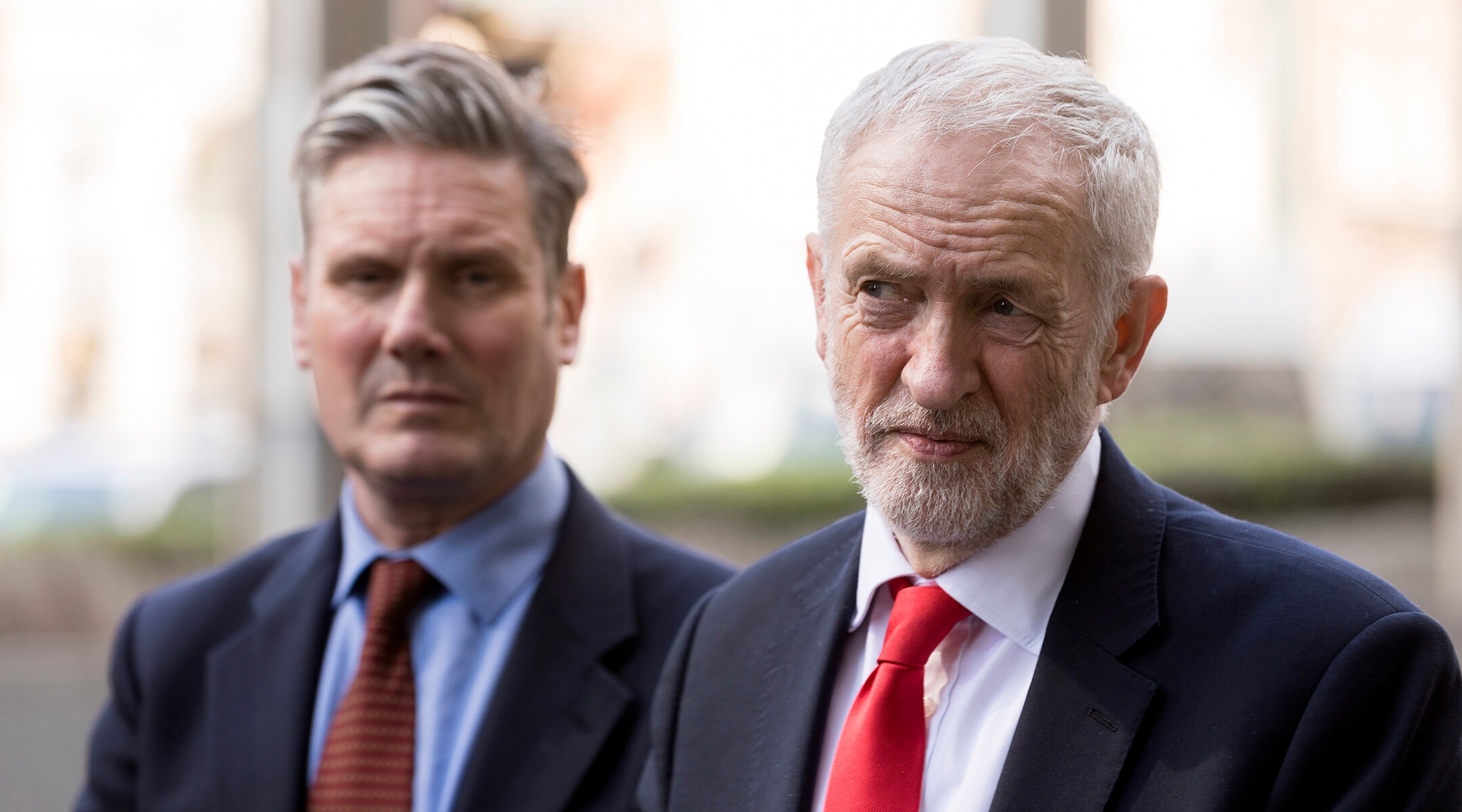 Former Labour leader Jeremy Corbyn, right, and his successor Keir Starmer talk to journalists in Brussels, Belgium on March 21, 2019. (Thierry Monasse/Getty Images)