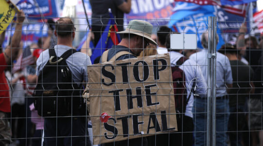 Supporters of President Donald Trump demonstrate at a ‘Stop the Steal’ rally in front of the Maricopa County Elections Department office in Phoenix on November 7, 2020. (Mario Tama/Getty Images)