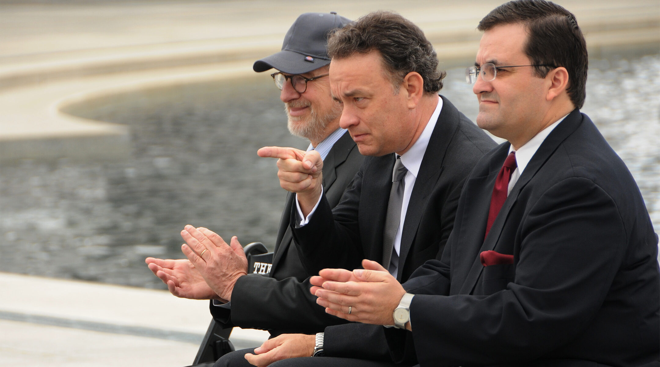 Actor Tom Hanks, center, points to veterans at the World War II Memorial in Washington, DC on March 11, 2010.(Wikimedia Commons)