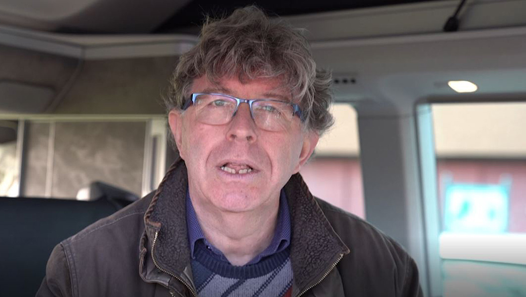 Anthony Lishak interviews a survivor of the Holocaust inside the Learning from the Righteous mobile studio in London, UK in December 2020. (Learning from the Righteous)