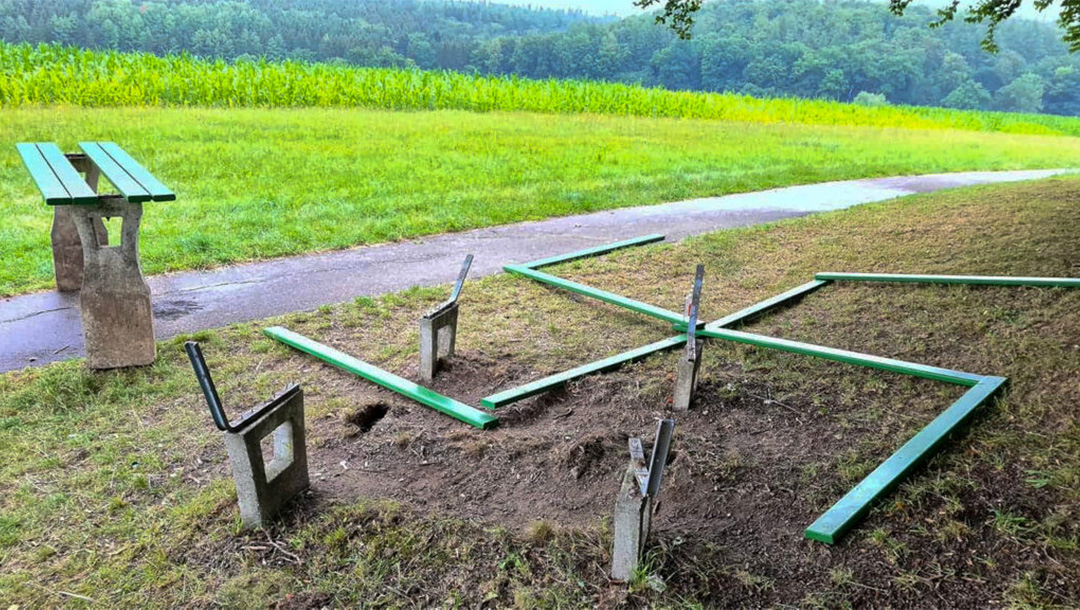 Parts of a vandalized picnic table arranged in the shape of a swastika near the Jewish cemetery of Krumbach, Germany in 2020. (AllgaeuRechtsaussen)