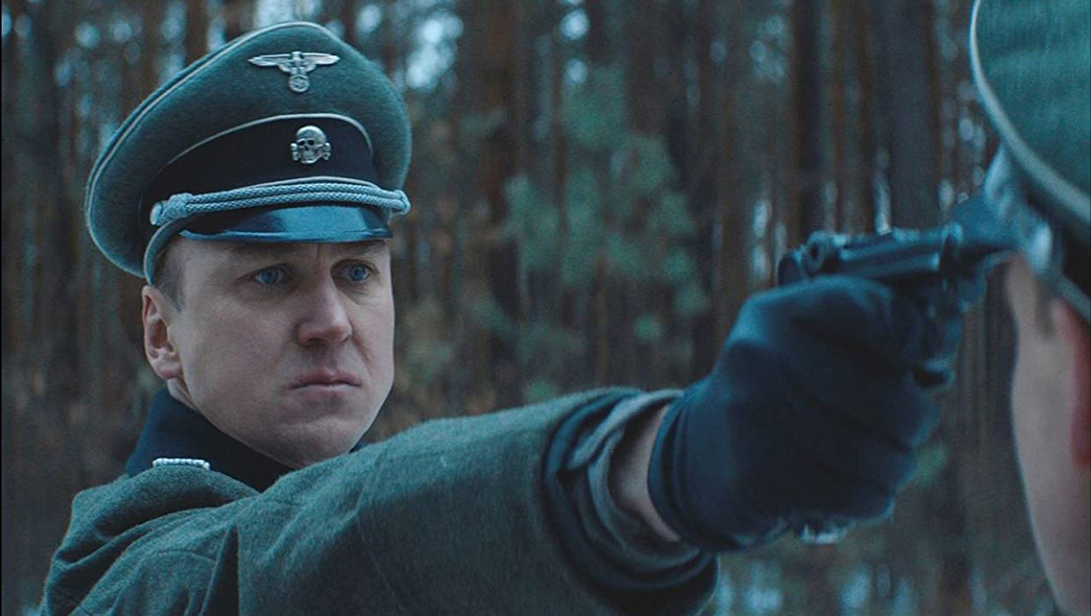 Actor Lars Eidinger portrays a Nazi officer at a concentration camp during filming in Belarus of the film 'Persian Lessons' in 2019. (Courtesy of HyperFilms)